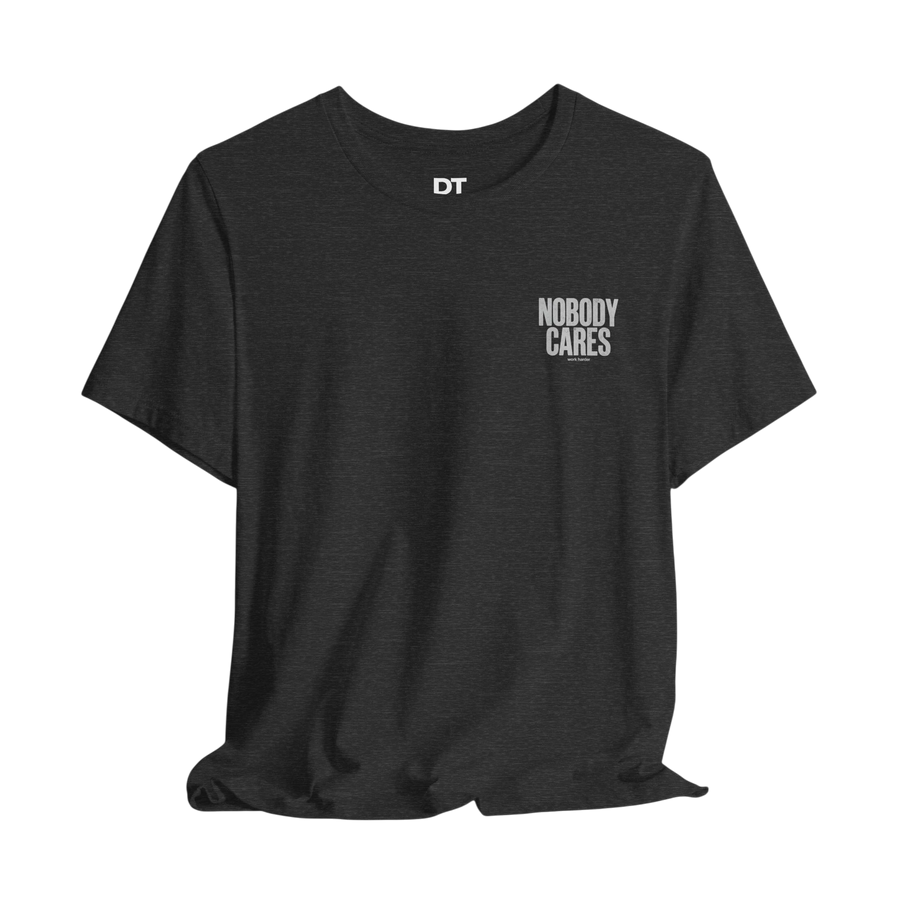 DailyThreadCo. dark grey cotton t-shirt with "Nobody Cares" graphic and DT logo.