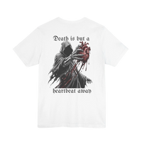 DailyThreadCo. white 100% cotton t-shirt with a graphic of the Grim Reaper holding a bloody anatomical heart and the text 