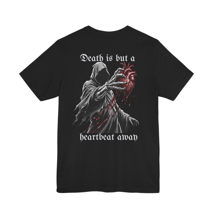 DailyThreadCo. black 100% cotton t-shirt with a graphic of the Grim Reaper holding a bloody anatomical heart and the text "Death is but a heartbeat away".