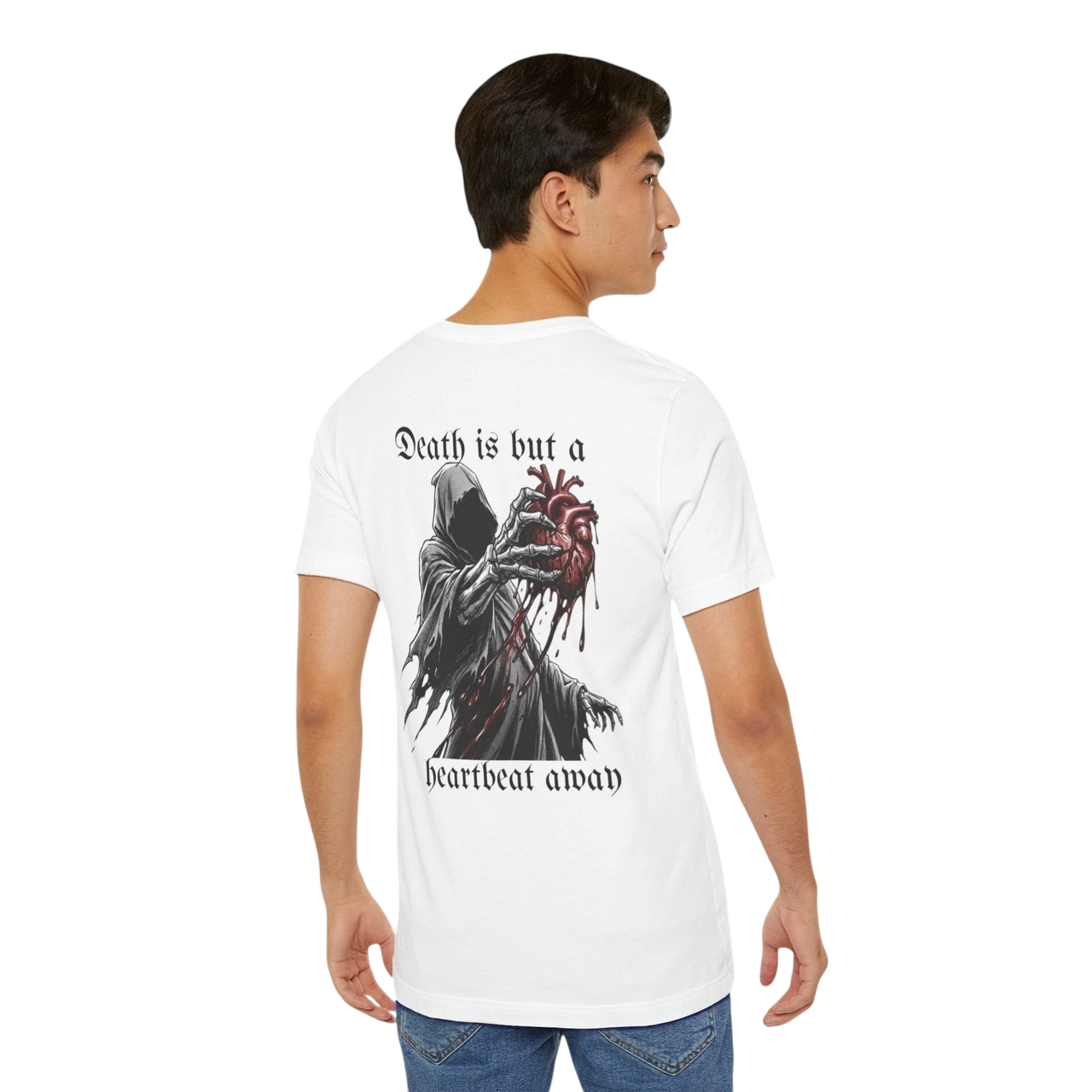 DailyThreadCo. white 100% cotton t-shirt with a graphic print of the Grim Reaper holding a bloody anatomical heart and the text "Death is but a heartbeat away".