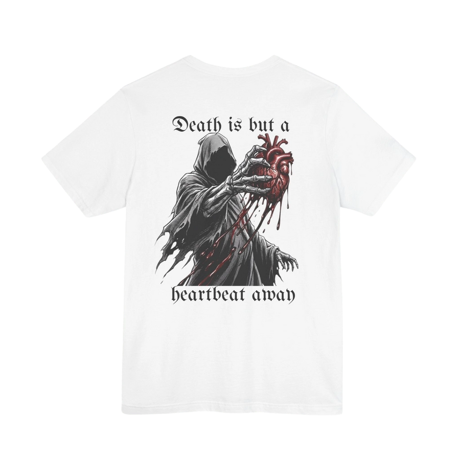 DailyThreadCo. white 100% cotton t-shirt with a graphic of the Grim Reaper holding a bloody anatomical heart and the text "Death is but a heartbeat away".