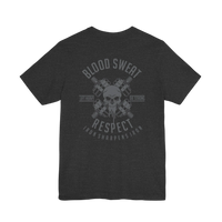 DailyThreadCo. dark grey 100% cotton t-shirt with a graphic print of crossed barbells and a skull, featuring text 