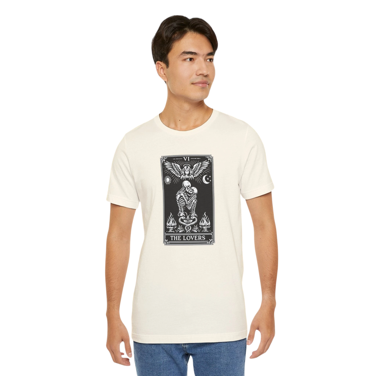 DailyThreadCo. cream cotton t-shirt with black and white 'The Lovers' tarot card graphic. Features skeleton couple, angel, sun, moon, and flames.