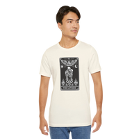 DailyThreadCo. cream cotton t-shirt with black and white 'The Lovers' tarot card graphic. Features skeleton couple, angel, sun, moon, and flames.
