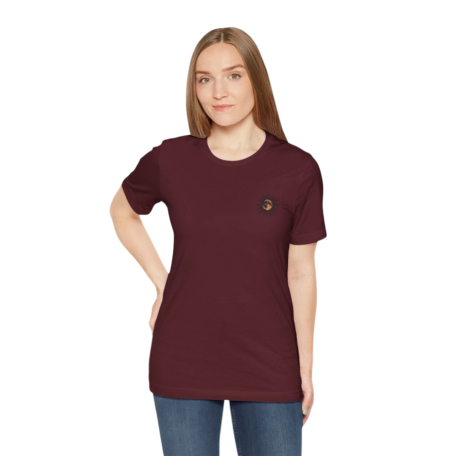 DailyThreadCo. maroon 100% cotton crew neck t-shirt with a small celestial sun and moon graphic on the left chest.