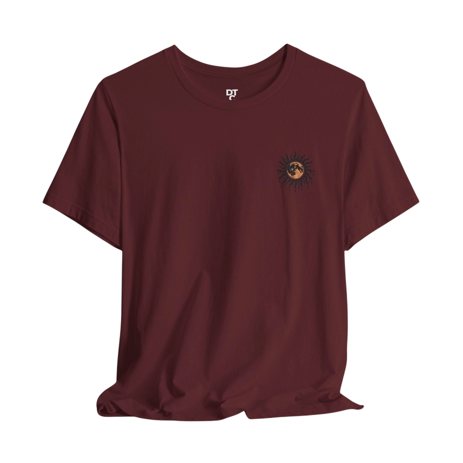 DailyThreadCo. maroon 100% cotton tee with a retro celestial sun and moon graphic on the back and a smaller emblem on the chest.