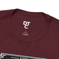 DailyThreadCo. maroon 100% cotton crew neck t-shirt with vintage Strength tarot card illustration of a woman and lion.