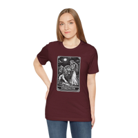 DailyThreadCo. maroon crew neck t-shirt with vintage Strength tarot card illustration of a woman and lion.