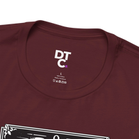 DailyThreadCo. maroon 100% cotton t-shirt with 'The Fool' tarot card graphic on the front.