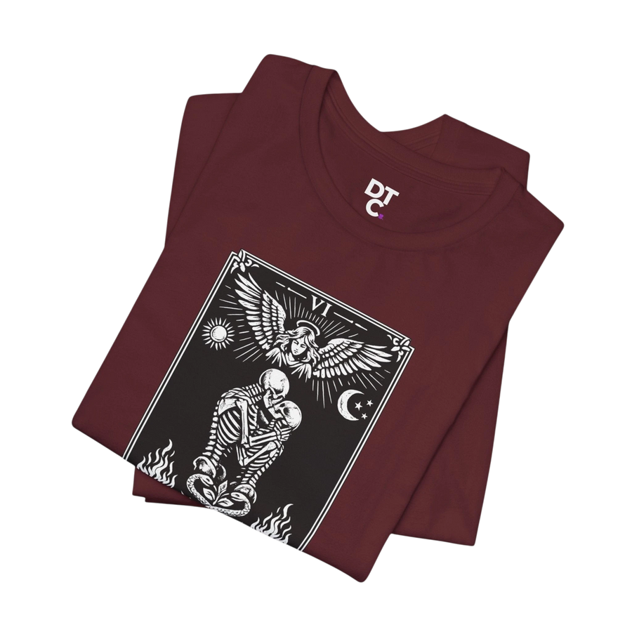 DailyThreadCo. maroon cotton t-shirt with a black and white graphic of The Lovers tarot card featuring skeletons, an angel, sun, moon, and flames.
