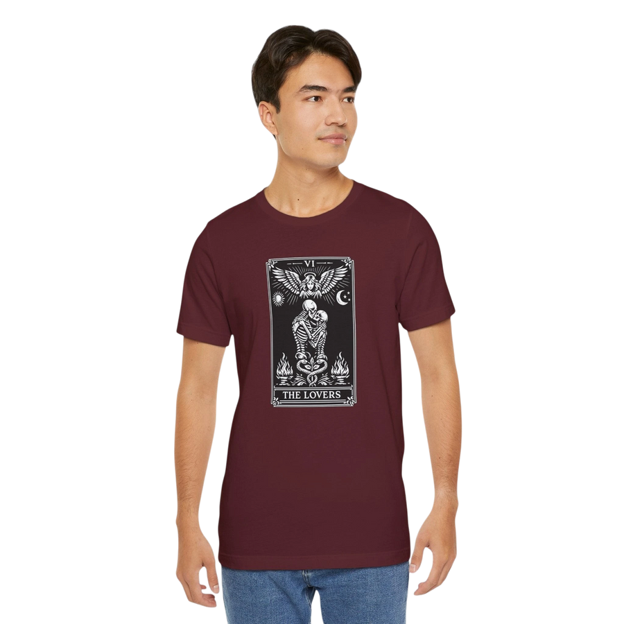 DailyThreadCo. maroon 100% cotton t-shirt with a black and white graphic of The Lovers tarot card, featuring skeletons, an angel, sun, moon, and flames.