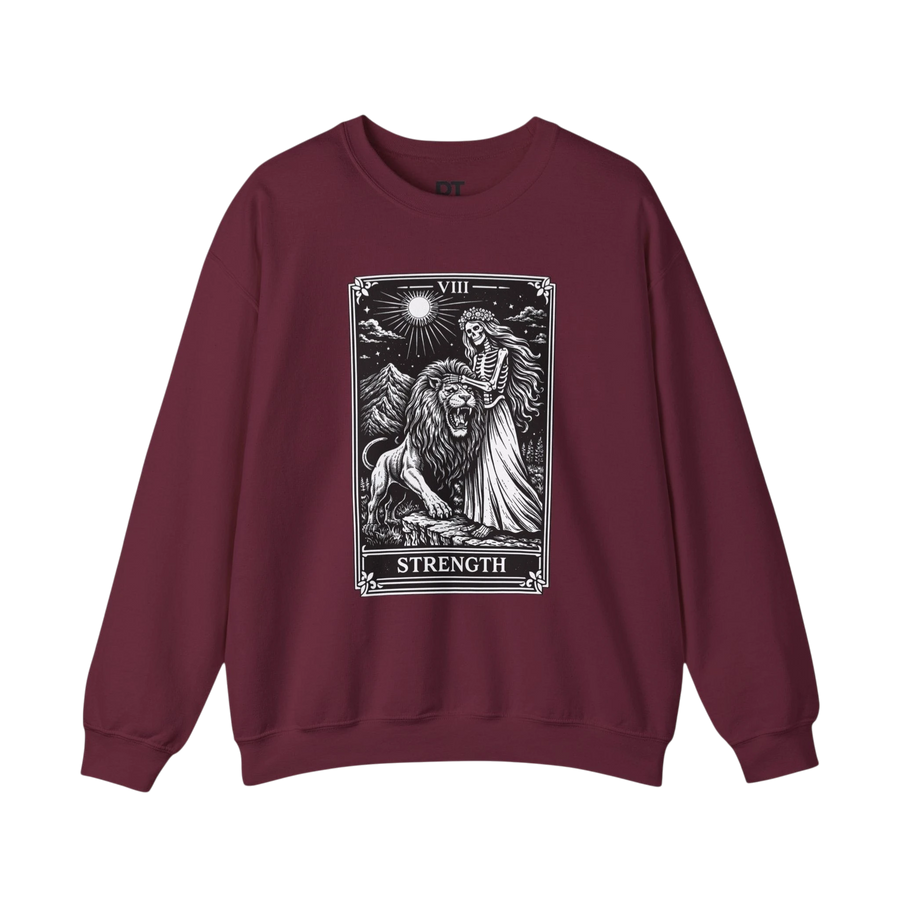 DailyThreadCo. maroon crewneck sweatshirt with a black tarot strength card graphic featuring a skeleton woman and a lion.