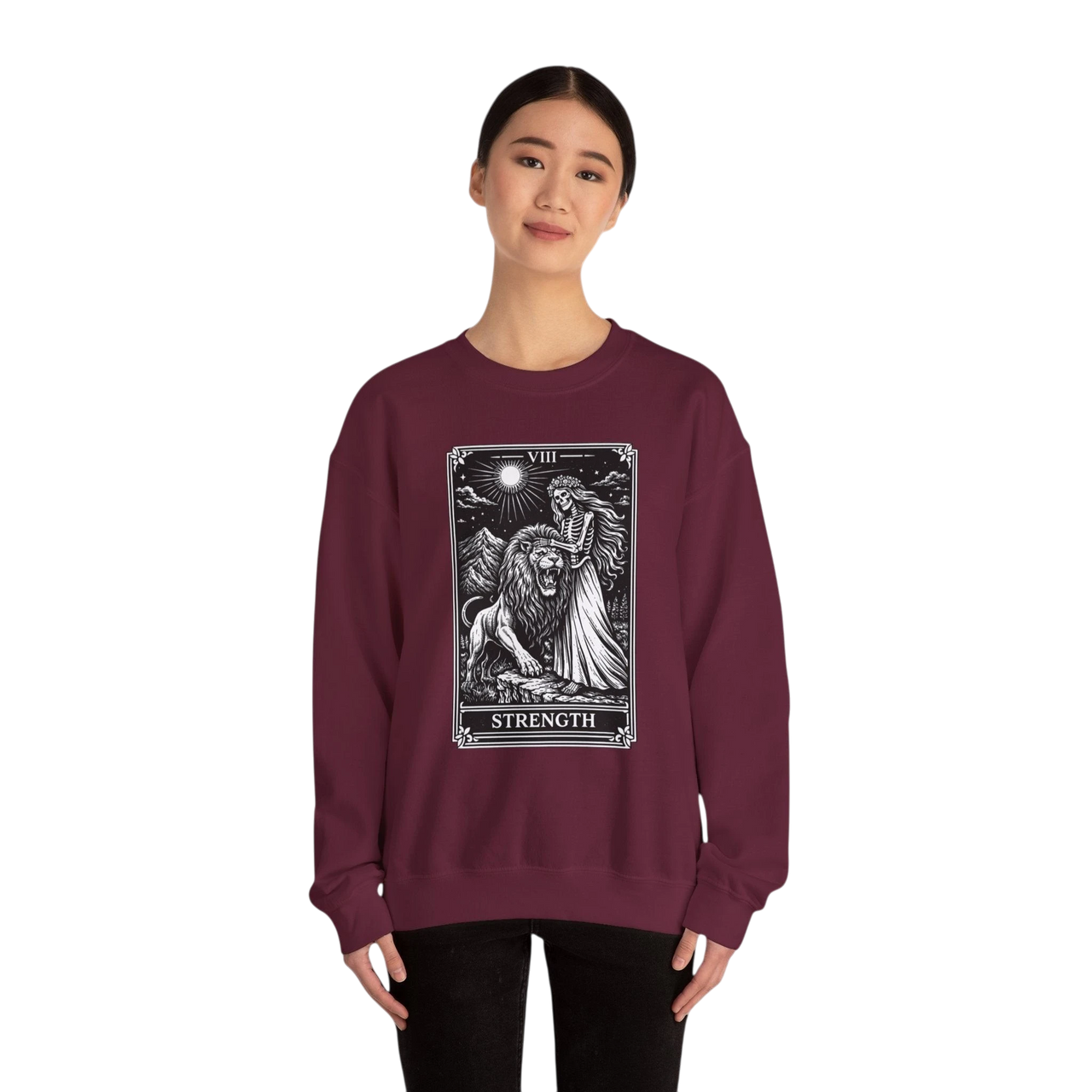 DailyThreadCo. maroon crewneck sweatshirt with a black and white tarot strength card graphic featuring a woman and a lion.