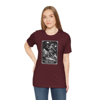 DailyThreadCo. maroon cotton t-shirt with 'The Fool' tarot card graphic print on the front.