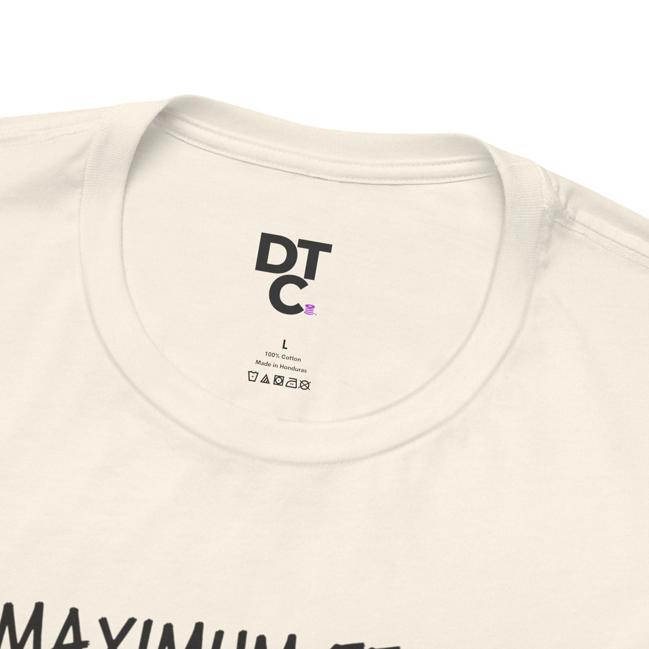 DailyThreadCo. cream 100% cotton t-shirt with "MAXIMUM EFFORT" graphic and DT C logo on tag.