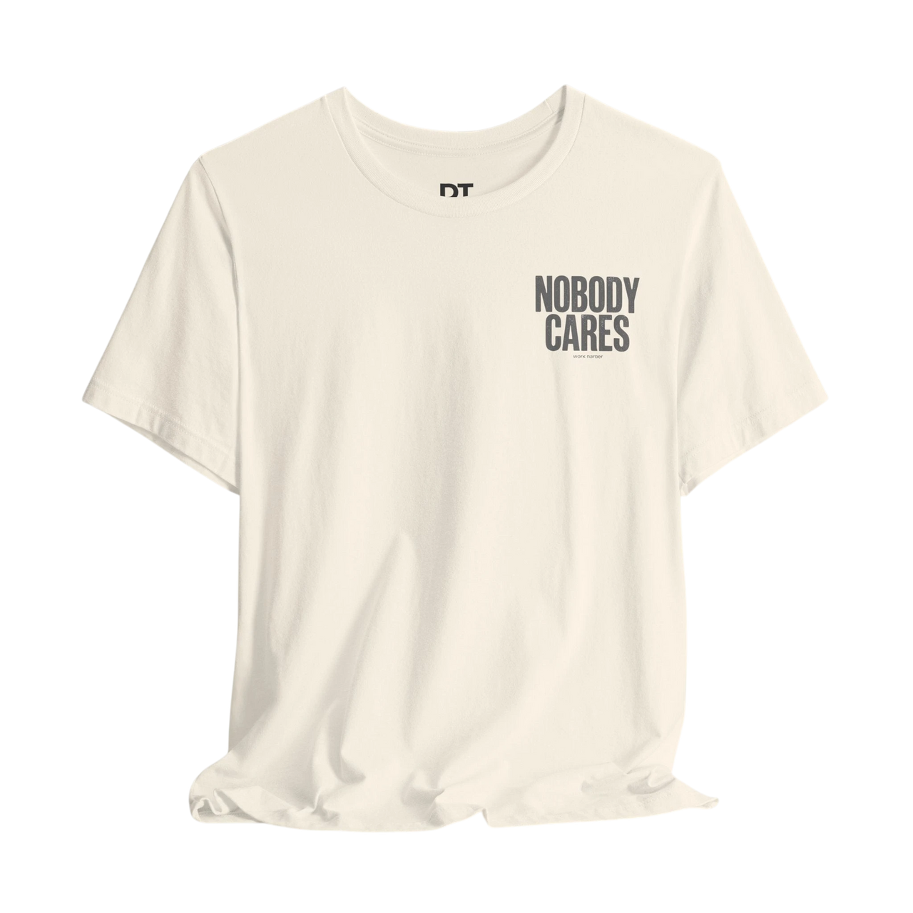 DailyThreadCo. cream 100% cotton graphic tee with "Nobody Cares" text art on the chest.
