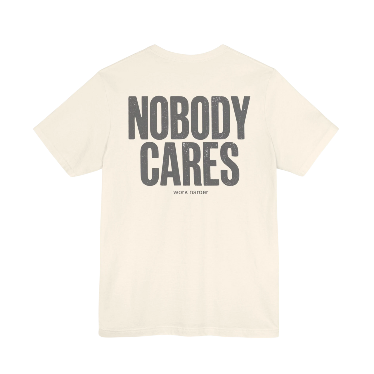 DailyThreadCo. cream cotton graphic tee with "NOBODY CARES" and "work harder" text art on back.