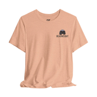 DailyThreadCo. light peach athletic tee with crew neck and small chest graphic of a skull with 
