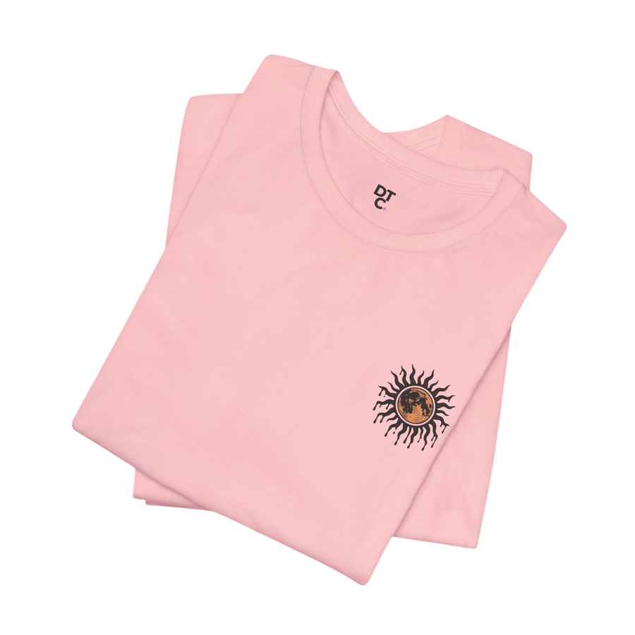 DailyThreadCo. light pink 100% cotton crewneck tee with a celestial sun and moon graphic on the left chest.