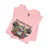 DailyThreadCo. pink 100% cotton t-shirt with a graphic of a possum lifting a barbell and the text 