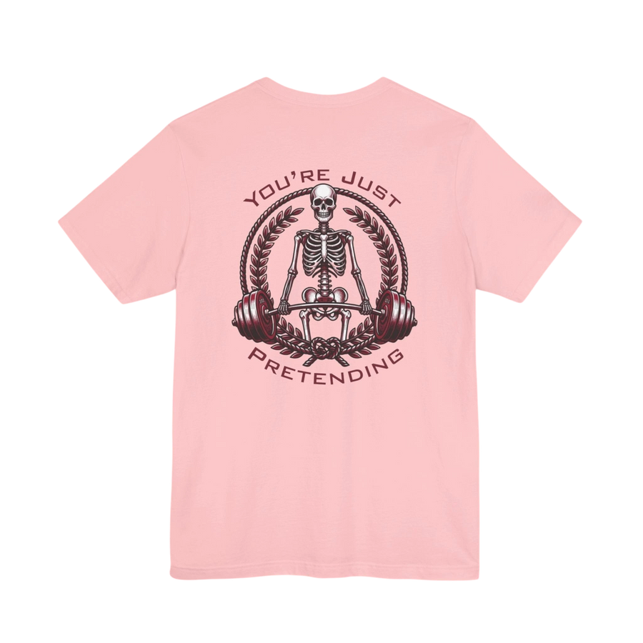 DailyThreadCo. light pink 100% cotton t-shirt with a skeleton weightlifter graphic and "You're Just Pretending" text.