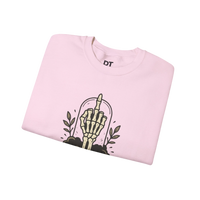 DailyThreadCo. light pink crewneck sweatshirt with a graphic of a skeleton hand giving the middle finger inside a glass dome, surrounded by leaves.