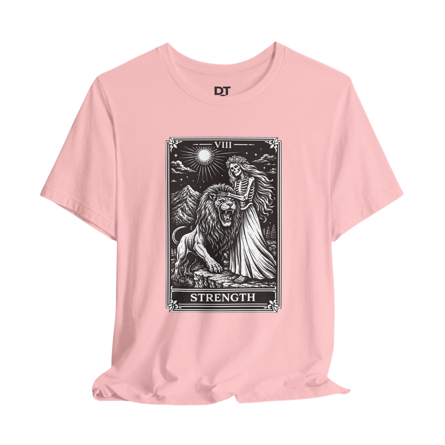 DailyThreadCo. pink crew neck t-shirt with vintage Strength tarot card illustration of a skeleton woman and lion.