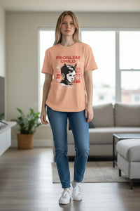 DailyThreadCo. peach cotton t-shirt with retro punk 'Problem Child' graphic featuring a devilish boy, roses, and peace sign.