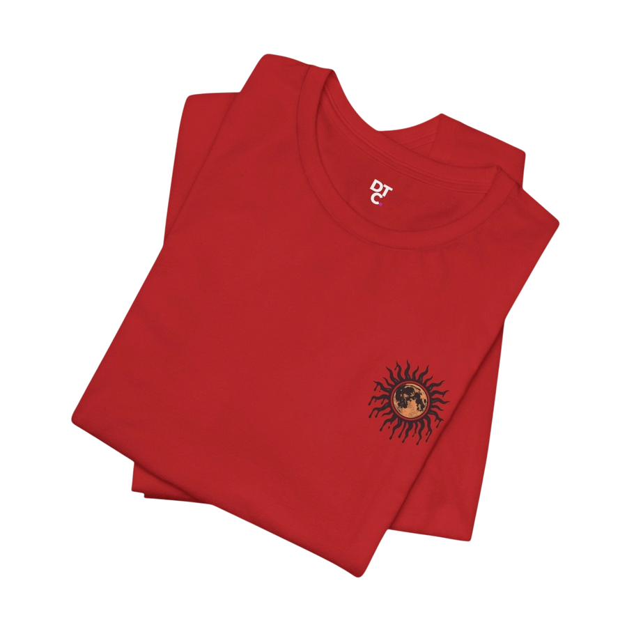 DailyThreadCo. red 100% cotton crew neck t-shirt with a celestial sun and moon graphic on the left chest.