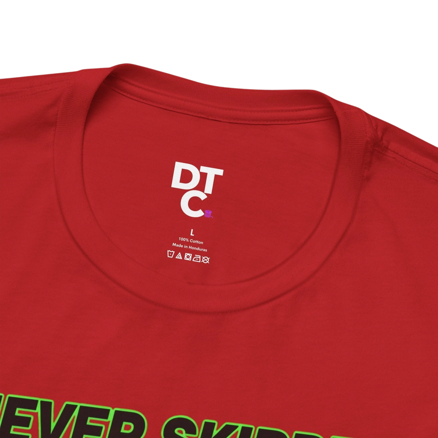 DailyThreadCo. red 100% cotton t-shirt with a graphic print of a pigeon and text "NEVER SKIPPED CHEST DAY".