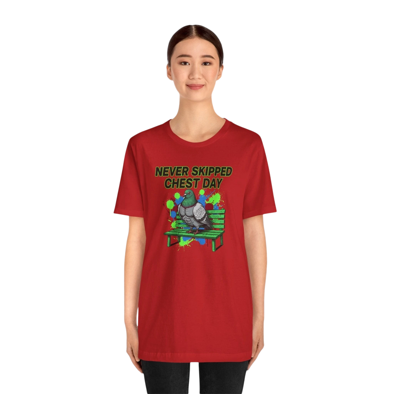 DailyThreadCo. red cotton t-shirt with a graphic print of a pigeon on a bench, text reads "NEVER SKIPPED CHEST DAY".
