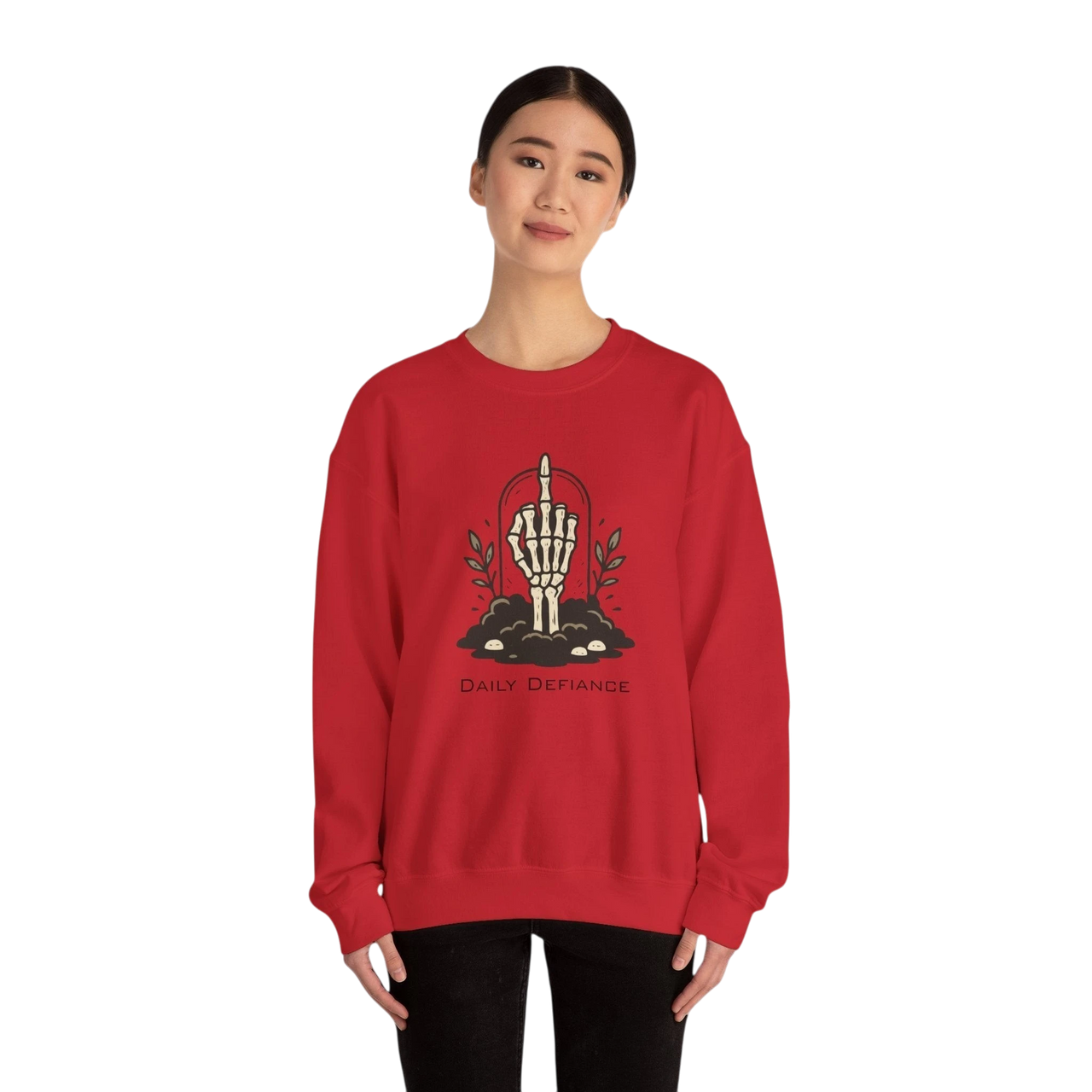 DailyThreadCo. red crewneck sweatshirt with a skeleton hand graphic giving the middle finger, surrounded by foliage and the words "Daily Defiance."