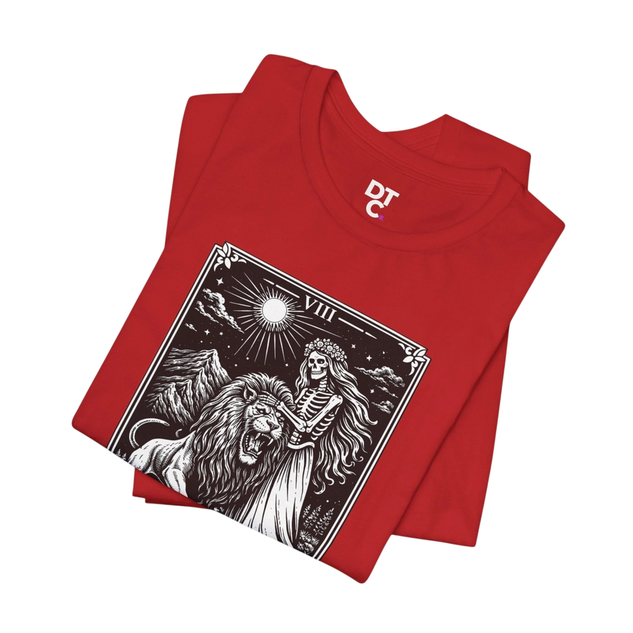 DailyThreadCo. red crew neck t-shirt with vintage Strength tarot card illustration of a woman and lion.