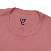 DailyThreadCo. muted rose 100% cotton t-shirt with a graphic print on the back and a small chest emblem. Size L.