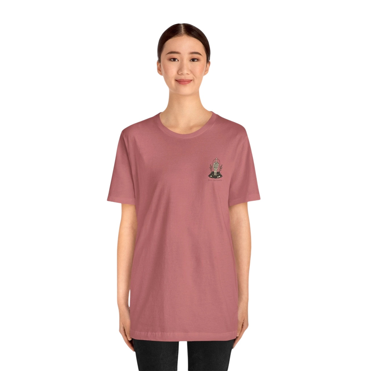 DailyThreadCo. Muted rose 100% cotton t-shirt with a small gothic skeleton hand graphic on the chest.