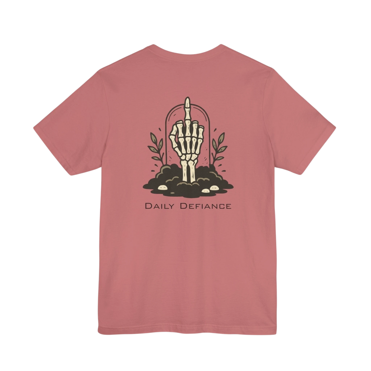 DailyThreadCo. Muted rose 100% cotton t-shirt with a graphic of a skeleton hand rising from the ground with leaves and the text Daily Defiance.