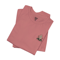 DailyThreadCo. muted rose 100% cotton t-shirt with a small chest graphic of a skeleton hand rising from earth and 