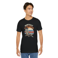 DailyThreadCo. black 100% cotton t-shirt with a retro graphic of a skeleton relaxing on a beach chair under palm trees, text reads 