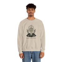 DailyThreadCo. beige crewneck sweatshirt with a black graphic of a skeleton hand giving the middle finger emerging from the ground with foliage and the words 