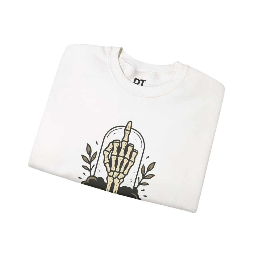 DailyThreadCo. white crewneck sweatshirt with a graphic of a skeleton hand giving the middle finger inside a glass dome, surrounded by leaves.