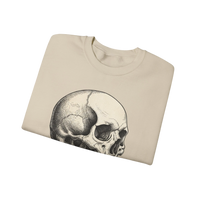 DailyThreadCo. cream crewneck sweatshirt with a detailed black ink anatomical skull graphic on the chest, featuring subtle purple crystal accents.