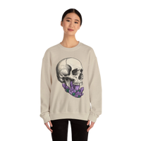 DailyThreadCo. cream crewneck sweatshirt with a black line drawing of a skull with purple crystals emerging from its mouth.