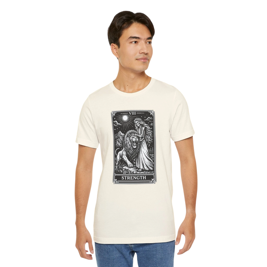 DailyThreadCo. cream 100% cotton t-shirt with vintage Strength tarot card illustration of a woman and lion.