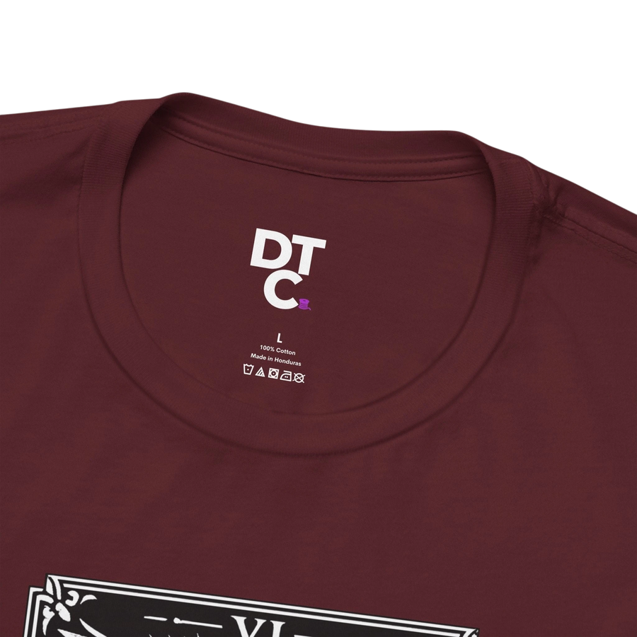 DailyThreadCo. maroon 100% cotton t-shirt with 'The Lovers' tarot card graphic and DT C logo on the tag.