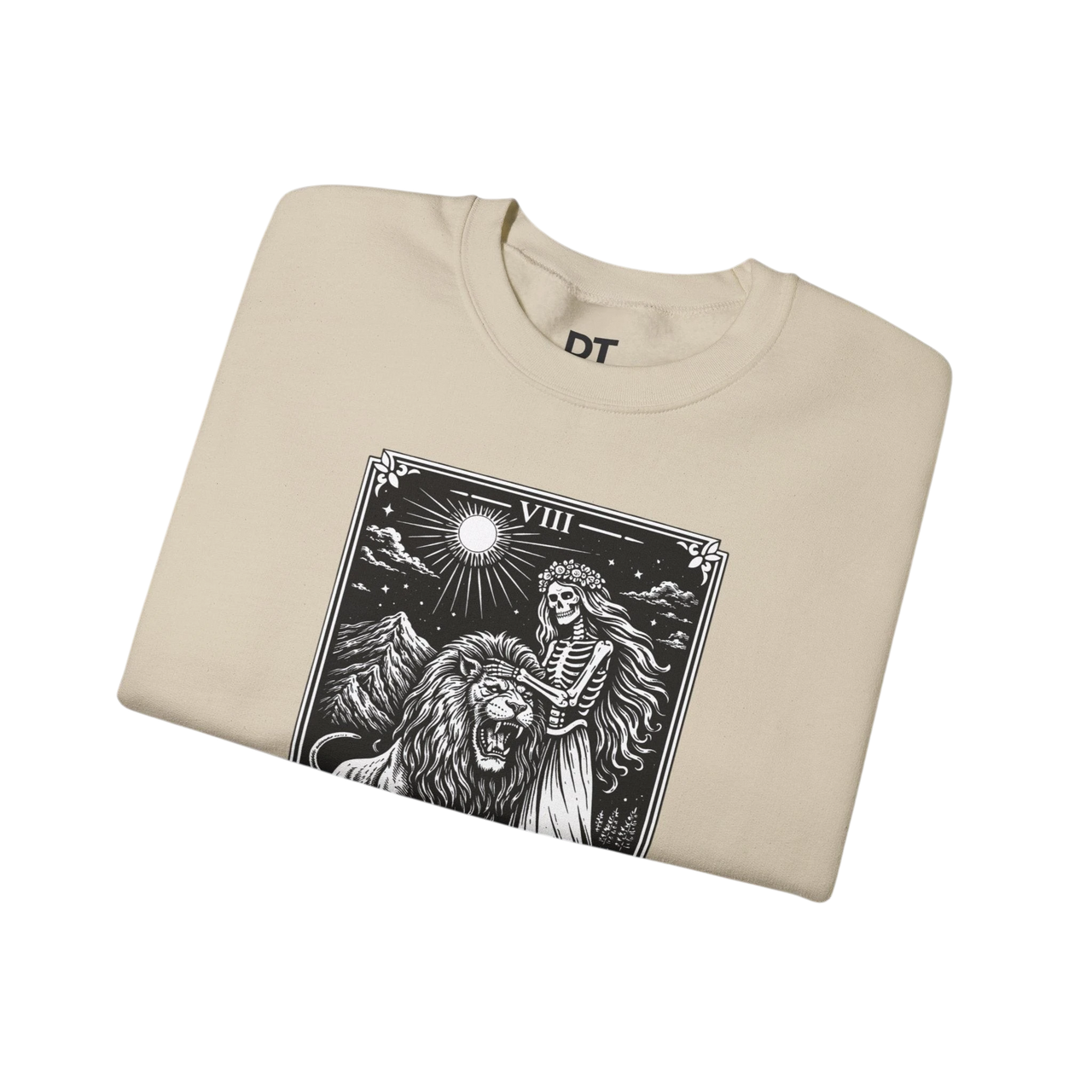 DailyThreadCo. cream crewneck sweatshirt with a black tarot card graphic of a skeleton woman with a lion and mountains.