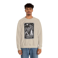 DailyThreadCo. beige crewneck sweatshirt with a black tarot strength card graphic featuring a woman and a lion.