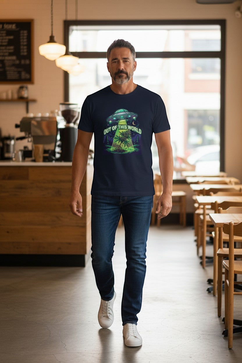 DailyThreadCo. navy blue cotton t-shirt with a graphic of a UFO beaming up a cannabis plant under a starry sky, text reads "OUT OF THIS WORLD".