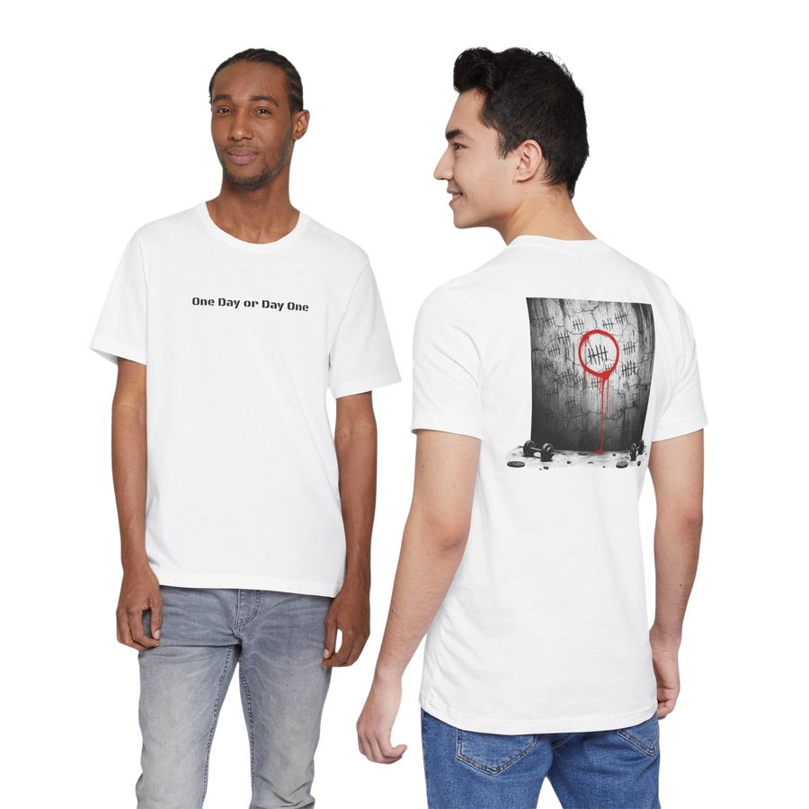 DailyThreadCo. white 100% cotton t-shirt with "One Day or Day One" text on front and tally marks graphic on back.
