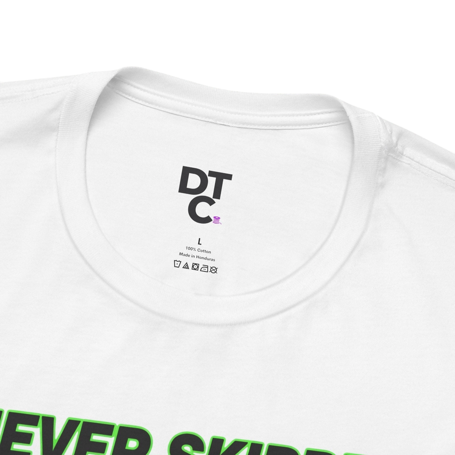 DailyThreadCo. white 100% cotton t-shirt with a graphic print of a pigeon and text "NEVER SKIPPED CHEST DAY".