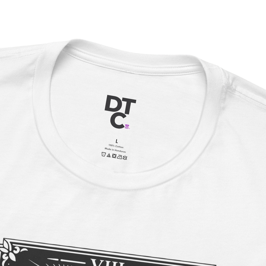 DailyThreadCo. white 100% cotton crew neck t-shirt with vintage Strength tarot card illustration of a woman and lion.